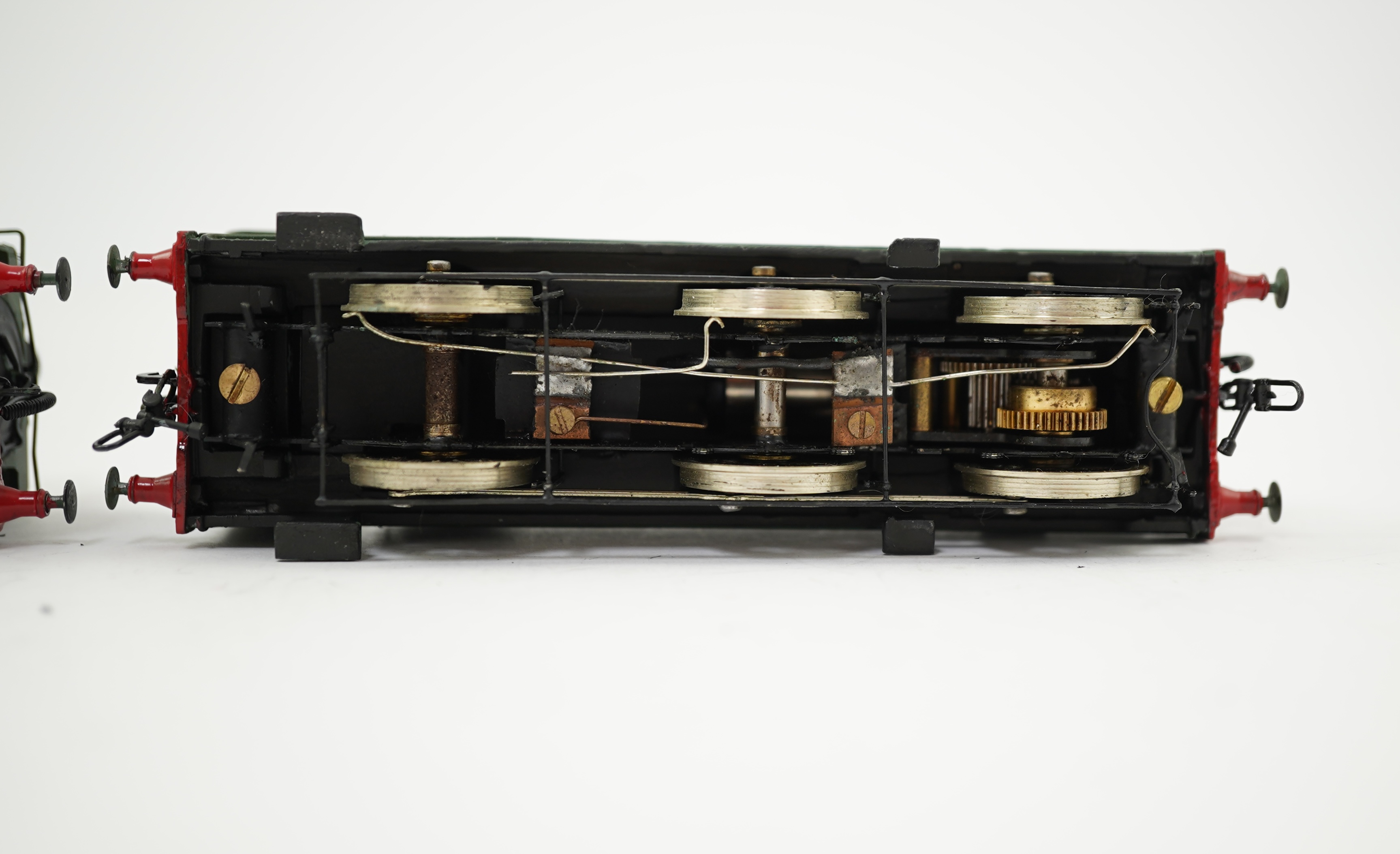 Two 00 gauge brass and white metal kit built GWR tank locomotives; a 2021 class 0-6-0PT, 2032, together with an 1854 class 0-6-0ST, 1858, constructed, painted and lined to a high standard, both motored for two rail opera